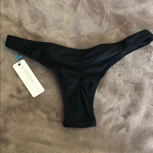 Black cheeky bathing suit bottoms